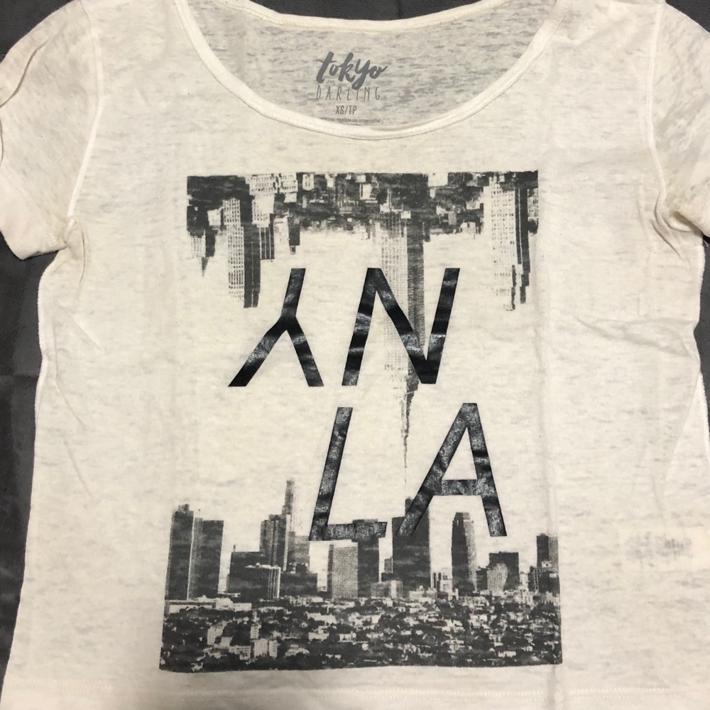 Thin lightweight tshirt with black graphic design